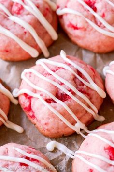 strawberry shortbread cookies with white icing on top