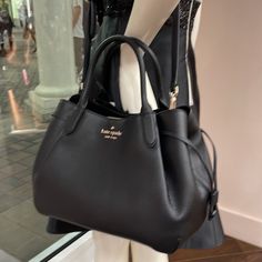 Kate Spade New York Dumpling Large Satchel Black Measurements 10" W X 9" H X 6.8" D Exterior: Front And Back Slip Pockets 10" W (At Top) 14.125" W (At Widest) Handle Drop: 5.125" Features Strap Drop: 22 Closure Type: Magnetic Snap And Zipper Closures Dust Bag Included: No Interior: Back Zip Pocket Materials Pebbled Leather Lining: Two Way Spade Jacquard Lining Style Number K8134 Color: Black Kate Spade Aesthetic Bag, Kate Spade Aesthetic, Dream Purse, Kate Spade Bag Black, Elegant Style Women, Kate Spade Satchel, Brown Satchel, Kate Spade Cameron Street, Office Bag