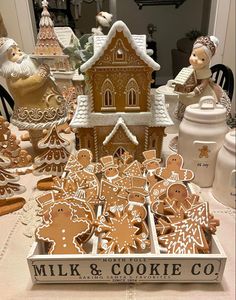 a table topped with lots of ginger cookies