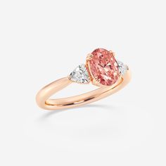 2 ctw Oval Lab Grown Diamond Fancy Pink With Trillion Three-Stone Engagement Ring 14K Rose Gold Luxury Oval Rose Gold Diamond Ring, Luxury 14k Rose Gold Oval Rings, Luxury Oval Morganite Wedding Ring, Oval Morganite Ring In Pink Gold, Oval Morganite Rings In Pink Gold, Pink Gold Morganite Oval Ring, Oval Morganite Wedding Ring With Brilliant Cut, Oval Rose Gold Diamond Ring With Gemstone, Oval Pink Gold Diamond Ring