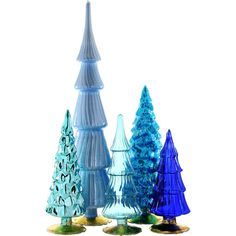 three different colored glass trees on a white background