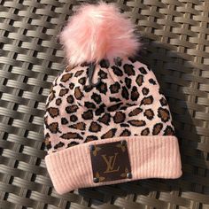 Leopard Print Pink Beanie with Pom Pom DISCLAIMER-- We do NOT sell licensed Louis Vuitton products. This is an upcycled item made from new products and used LV bags. We legally purchase items from wholesale vendors who use previously loved items to create our upcycled products. Southern Diva Designs is in NO WAY associated or affiliated with Louis Vuitton and/or their subsidiaries. Upcycled Products, Leopard Print Pink, Beanie With Pom Pom, Pink Beanie, Beanie With Pom, Wholesale Vendors, Diva Design, Pink Beanies, Lv Bags