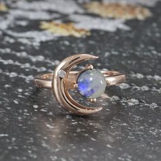 Mystical Cabochon Rings As A Gift, Vintage Opal Birthstone Ring Gift, Heirloom Crescent Jewelry For Gifts, Heirloom Crescent Jewelry Gift, Vintage Rings For Jewelry Making With Birthstone, Celestial Style Round Birthstone Ring As A Gift, Celestial Style Round Birthstone Ring For Gifts, Celestial Round Birthstone Ring As Gift, Celestial Style Round Birthstone Ring Gift