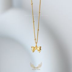 This delicate, feminine bow pendant necklace is made of 925 Sterling Sliver and gold plated.  It can be worn on its own, or stacked with other necklaces.  This necklace is the perfect choice for a variety occasions, whether it is as a birthday, anniversary, or just to mark a significant day, you will have the perfect accessory to make that moment special.  This wonderful piece of jewelry will make a sweet, thoughtful, and precious gift for yourself or that special someone. *Material: 925 Sterlin Gold Necklaces With Butterfly Knot For Gift, Gold Butterfly Knot Necklace For Gift, Gold Necklace With Butterfly Knot For Gift, Gold Bow Necklaces For Gifts, Gold Necklaces With Bow As Gifts, Gold Necklaces With Bow For Gifts, Gold Necklace With Bow As Gift, Gold Necklace With Bow For Gifts, Gold Plated Bow Jewelry Gift