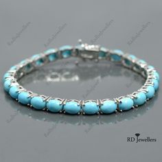 This Listing is For-: Natural Turquoise Bracelet, 925 Silver Bracelet, Sleeping Beauty Turquoise, Tennis Bracelet, Turquoise Silver Jewelry, December Birthstones PRODUCT CODE --- RJ-5643 BIRTHSTONE --- DECEMBER METAL --- 925 STERLING SILVER PRODUCTS TYPE --- BRACELET STONE DIMENSION --- 7x5 MM STONE WEIGHT --- 16.10 CTS. TOTAL WEIGHT --- 14.6 GRAMS Turquoise Benefits- *As a healing stone, Turquoise is among the crystal healing master stones. *According to followers of the New Age, the healing po Sterling Silver Turquoise Oval Bracelet Gift, Turquoise Sterling Silver Bracelet Gift, Turquoise Sterling Silver Bracelets For Anniversary, Turquoise Sterling Silver Bracelet For Anniversary, Elegant Turquoise Oval Sterling Silver Bracelet, Turquoise Gemstone Sterling Silver Bracelet, Turquoise Benefits, Silver Tennis Bracelet, Silver Turquoise Jewelry