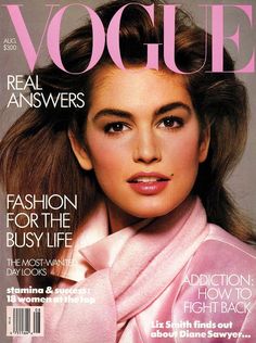 a magazine cover with a beautiful woman in pink