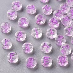 "Clear letter beads with orchid purple lettering. Double sided. Great for making fun gifts, personalized jewelry and kids crafts. Mixed at random and may not contain all letters.  (if you need all letter please purchase the A-Z lot) Quantity: see options Size: 7mm  Approx:7mm( 2/8\") Dia. Hole size: 1.6mm Thickness: 3.7mm( 1/8\") There may be slight variances in sizes depending on batch Have  questions?  see the FAQ page in images including shipping details" Beaded Name Bracelet, Query Letter, Purple Beads, Alphabet Beads, Orchid Purple, Acrylic Letters, L Alphabet, Letter Beads, Name Bracelet