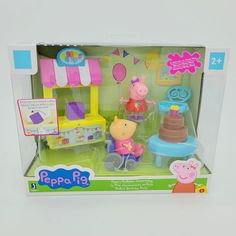 the peppa pig playset is in its box with other toys and accessories on display