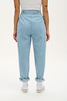 Addison Is Our High Waist Trousers With Elasticated Back And Tapered Leg. Referred To As “Magic Trousers” By Those With Big Hips And Withoutavailable Here In Light Wash Blue Denim! Our Fit High Waisted With A Wide Waistband To Sit Over The Waist, Extra Ease With Elasticated Side Panels Pleated Front To Allow Loose Fitting Over The Hips Tapered Full Length Leg With Room To Roll Deep Side Pockets The Fabric Made From 100% Gots Certified Organic Cotton Denim The Fabric Is Soft, Breathable And Durab Medium Wash Mom Fit Bottoms For Spring, Spring Medium Wash Mom Fit Bottoms, Spring Denim Blue Mom Fit Bottoms, Denim Blue Mom Fit Bottoms For Spring, Everyday Recycled Denim Bottoms For Spring, Fitted Casual Recycled Denim Pants, Spring Tapered Denim Bottoms, Casual Medium Wash Tapered Bottoms, Blue Mom Fit Jeans For Spring