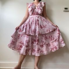 Light Pink And Maroon Floral Tiered Chiffon Midi Dress. Deep Vneck With Ruffles, And An Open Back With A Zipper On The Skirt. The Back Is Apron Style And Connects Straight Down. Super Flowy And Beautiful, Brand New, Originally $279. Great For A Wedding Or Special Occasion. Brand: Nordstrom Size: 2 Measurements: 27” Waist, 15” From Waist To Shoulder, 47” Long Tiered Chiffon Dress For Daywear, Sleeveless Georgette Dress With Ruffles, Spring Georgette Dress With Ruffles, Vintage Chiffon Midi Dress, Midi Chiffon Dress With Ruffles For Garden Party, Midi-length Chiffon Dress With Ruffles For Garden Party, Daywear Silk Chiffon Dress With Ruffles, Bohemian Tiered Chiffon Dress, Red Floral Print Georgette Dress