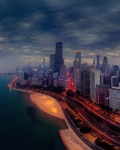 an aerial view of the chicago skyline at night