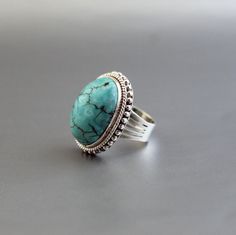 Description Turquoise Ring, Solid Sterling Silver Ring, Handmade Jewelry, Oval Turquoise Ring, Birthstone Ring, Statement, Natural, Ring For Her✦Gemstone : Turquoise *may contain natural inclusions inside the stone ✦Stone Shape : Oval Cabochon ✦Gemstone: Turquoise ✦Metal: 925 Sterling Silver Natural stones may vary slightly in shape, size and color.Handmade ItemYou will receive the same piece as in the picture or identical. Since all gemstones are different from each other, I cannot guarantee that the gemstone you see above will still be available.. But I assure you will get same quality piece as shown in the above picture.# Your order will be dispatch within 3-5 working days after receiving order# Items will be sent via registered airmail and take approx. 15-20 days to arrive. # Express m Bohemian Style Emerald-colored Ring, Turquoise Ring With Natural Stones, Turquoise Chrysocolla Gemstone Ring, Adjustable Turquoise Ring With Stones, Adjustable Turquoise Ring With Gemstones, Oval Turquoise Ring With Stones, Sterling Silver Turquoise Ring With Stones, Turquoise Chrysocolla Ring With Large Stone, Large Stone Turquoise Ring In Chrysocolla