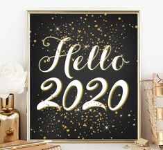 a black and gold poster with the words fero 2020 on it next to other items