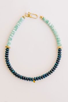 - This cutie is the stylish piece to elevate your look! - Teal apatite, aqua angelite stones - Gold vermeil - Carabiner closure - Color, shape, size will vary as all stones are unique Kids Athleisure, Semi Precious Necklace, Necklace Men, Swimwear Dress, Stone Gold, Elevate Your Look, Skirt Leggings, Accessories Necklace, Men Necklace