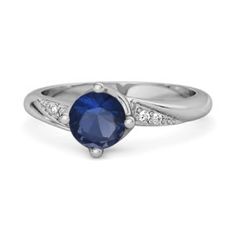 Classic Blue Sapphire Ring In 14k White Gold, Classic Blue Round Cut Diamond Ring, Formal Blue Birthstone Diamond Ring, Classic Blue Birthstone Ring, Formal Blue Diamond Ring With Birthstone, Blue Birthstone Diamond Ring For Formal Occasions, Modern Blue Jewelry With Prong Setting, Classic Blue Birthstone Ring With Round Stone, Blue Solitaire Ring With Round Stone