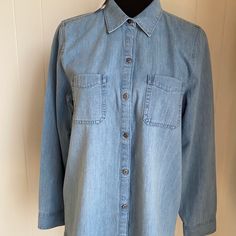 J. Jill Denim Nwt Women’s Chambray Denim Long Sleeve Button Shirt. This Is New And Never Been Worn. No Flaws Noted. All Button Are In Place. Size Medium. This Is A Very Soft Fabric. You Will Love It! Two Pockets On The Front And Detail On The Sides At The Bottom Hem. Very Nice! Extra Button Light Wash Denim Top With Buttoned Pockets For Spring, Light Wash Denim Top For Everyday, Everyday Light Wash Chambray Denim Top, Light Wash Collared Denim Top, Light Indigo Button-up Denim Top, Spring Chambray Denim Top With Button Closure, Light Wash Button-up Denim Top With Buttoned Pockets, Light Wash Denim Top With Buttoned Pockets, Light Wash Chambray Denim Jacket With Button Closure