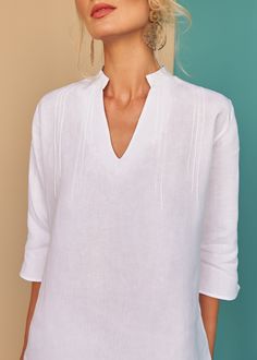 This Nyda tunic with textured pin-tuck details works a dream over your swim suit for lunch style with our Laura shorts or skin tight jeans for a beach side stroll. - 100% Italian "Masters of Linen"Pre-shrunkSoftened Relaxed Fit Beach Tops, Short Length, Relaxed Fit Short Length Beachwear Tops, Summer Beach Tops With Split Neck, Unlined Summer Tops, Unlined Summer Tops For Daywear, Unlined Summer Daywear Tops, Unlined Tops For Summer Daywear, Summer Tops With Relaxed Fit And Unlined, Summer Beach Top Short Length