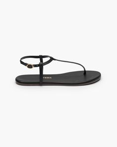 True minimalist form.Classic T-strap silhouette with a minimal ankle band and buckle. Hand made in Brazil with our premium soft leather, and cushioned insole so you can skip the break-in period. Sleek Black T-strap Sandals, Classic T-strap Sandals With Ankle Strap, Black Leather Sandals With Single Strap, Black Leather Single Strap Sandals, Sleek Black Sandals With Adjustable Strap, Black Ankle Strap Sandals For Everyday, Chic Adjustable T-strap Sandals With Removable Insole, Leather T-strap Sandals For Everyday, Classic Black T-strap Sandals