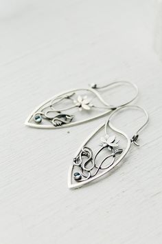 ITEM DESCRIPTION: Size H 6 x W 2 cm (2 1/2 x 2/3 inches) with closure. Wire earrings are very lightweight and comfortable for your ears. Weight - 4 g of each other. I made these hoop earrings of sterling silver and topaz swiss. The lotus flower and the shape of earrings are so elegant and unusual. They will be the best addition to your jewelry collection and will bring you many compliments. This is a really unique and valuable thing. I have some amazing jewelry with a lotus flower in my Etsy sho Artistic Teardrop Sterling Silver Jewelry, Artistic Sterling Silver Teardrop Jewelry, Artistic Sterling Silver Teardrop Earrings, Sterling Silver Art Nouveau Jewelry, Artistic Teardrop Silver Jewelry, Artistic Silver Teardrop Jewelry, Hammerhead Shark Necklace, Elven Jewelry, Shark Necklace