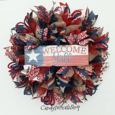 a patriotic wreath with the words welcome yall on it and an american flag design