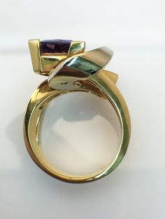 Birmingham Jewelry - 14K Yellow Gold Fashion Ring With Amethyst Center Stone - Birmingham Jewelry Yellow Gold Amethyst Ring With Round Cut Accent Stones, Yellow Gold Amethyst Ring With Accent Stones, Round Cut, Purple Ruby Ring For Formal Occasions, Modern Amethyst Ring With Accent Stones For Formal Occasions, Modern Amethyst Ring With Accent Stones For Formal Events, Formal Yellow Gold Round-cut Amethyst Ring, Formal Yellow Gold Amethyst Ring Round Cut, 14k Gold Brilliant Cut Purple Amethyst Ring, Formal Purple Ruby Ring