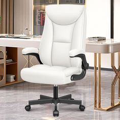 a white office chair sitting in front of a desk