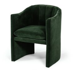 a green chair with an oval shaped back and foot rest on the side, sitting in front of a white background