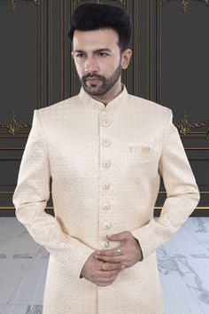 This men's sherwani (traditional Indian attire) features expertly crafted thread and sequin work. The intricate detailing adds a touch of elegance to any occasion. Made from high-quality materials, it offers both style and comfort. Perfect for those seeking a traditional yet sophisticated look. Formal Bandhgala With Chikankari Embroidery For Festive Season, Designer Nehru Jacket With Intricate Embroidery, Formal Bandhgala With Resham Embroidery For Festive Occasions, Traditional Fit Sherwani For Wedding And Diwali, Traditional Fit Bandhgala For Wedding, Festive Formal Nehru Jacket With Intricate Embroidery, Wedding Sherwani For Diwali, Designer Nehru Jacket With Naqshi For Formal Occasions, Designer Formal Traditional Wear With Chikankari Embroidery