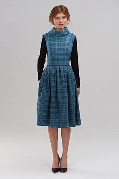 Dress For Women, Wool Dress, Plaid Dress❃ The power of a beautiful dress is not to be underestimated. The right dress can transform your confidence and break hearts from across the room. Unlock that power with this simply beautiful 1950s dress.❃ Mrs Pomeranz “Betsy” dress is made of Italian plaid wool fabric. This stylish winter dress features a fitted upper bodice with roll neck collar, comfortable long jersey sleeves and full pleated skirt with subtle side pockets. It fastens with a hidden zip Retro Blue A-line Midi Dress, Vintage Blue A-line Midi Dress, Blue Vintage A-line Midi Dress, Vintage Blue A-line Dress, Blue Knee-length Vintage Dress For Vintage Fashion, Blue A-line Vintage Fashion Dress, Vintage Light Blue Knee-length Dress, Blue 1950s Style Knee-length Vintage Dress, Blue Knee-length 1950s Vintage Dress