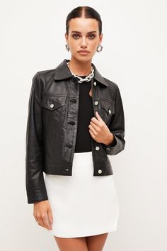 Perhaps the perfect leather jacket. Inspired by Western styles with its sharp collar and boxy silhouette, this butter-soft cover-up layers effortlessly over any ensemble and features classic details to refine the shape. Glossy silver buttons, patch pockets and buttoned cuffs bring a timeless vibe to a cropped style you’ll reach for time and time again, no matter the season.Expertly designed for those 5'3" and under, our Petite pieces are perfectly proportioned for a smaller frame using shorter l Trendy Fitted Leather Jacket With Button Closure, Classic Biker Jacket With Flap Pockets For Work, Classic Workwear Biker Jacket With Flap Pockets, Elegant Leather Cropped Jacket For Fall, Classic Leather Jacket With Flap Pockets, Classic Leather Biker Jacket For Spring, Chic Button-up Leather Jacket, Button-up Leather Jacket, Single-breasted Biker Jacket For Spring Workwear