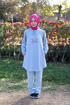 Kids Hijab Tunic Set Bouquet Model Blue   Fabric Feature : Made of sensual denim cotton fabric. Can be used for 4 seasons. Product Features : Our tunic set is made of tensel denim cotton fabric. Tunic and pants are offered for sale as a set. The front of the tunic has a zipper, drawstring and flower embroidery detail. Pockets are available. Arm ends are elasticized. The pants have an elastic waist and loose fit. https://www.etsy.com/shop/MevlanaKidsAbaya The molds of our products are precisely a Traditional Blue Hijab For Eid, Light Blue Long Sleeve Sets For Eid, Modest Blue Dresses For Eid, Casual Blue Dresses For Eid, Kids Abaya, Dubai Abaya, Eid Dresses, Denim Cotton, Niqab