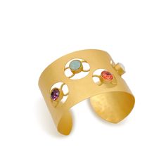 Made in NY The Eos Cuff is a shining sun right on your wrist. A thick hammered metal panel cuff where i have hand cutted the circles and bonded actines to give the Sun feeling & adorned with multi colored Austrian crystals. Available in Gold and Silver. Request your favorite crystal color. Platings: Gold : 18k electroplated gold Silver : Plated with pure silver and Oxidized to give an antique look.Crystal: High quality crystals.Please check the CRYSTAL COLOR GUIDE page for more color options.At Conservative Outfits, Color Guide, Jewelry Care Instructions, Gold Bracelet Cuff, Hammered Metal, Metal Panels, Austrian Crystal, Pure Silver, Jewelry Care