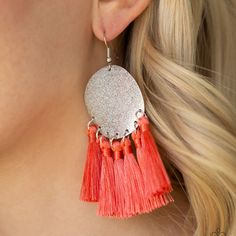 A fringe of shiny coral threaded tassels swing from the bottom of a warped silver disc brushed in an incandescent metallic shimmer for a whimsical flair. Earring attaches to a standard fishhook fitting.

Sold as one pair of earrings. Paparazzi Accessories, Affordable Jewelry, Fish Hook, Crochet Earrings, Tassels, Coral, Sparkle, Drop Earrings, Shop My