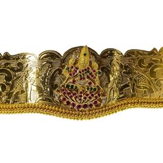 Add movement and luxury to your most festive looks with Vaddanam waist belts that will transform any look, like this 22K yellow gold Laxmi Vaddanam waist belt from Virani Jewelers. Features: • 22K Yellow Gold • Laxmi Image • Laser etched design • Precious rubies, emeralds and CZ gemstones • Adjustable Belt Virani Jewelers has always been committed to providing only the purest in 22K gold jewelry with beautiful and timeless jewelry pieces, much like this 22K yellow gold Laxmi Vaddanam waist belt Traditional Gold Bridal Belt For Festivals, Traditional Gold Bridal Belt For Ceremonial Use, Bollywood Gold Bridal Belt For Festivals, Traditional Bridal Belt For Diwali Ceremonial, Traditional Bridal Belt For Diwali, Traditional Bridal Belt For Ceremonial Festive Occasions, Festive Yellow Temple Necklace, Elegant Gold Temple Necklace With Motifs, Bollywood Bridal Belt For Diwali Ceremonial