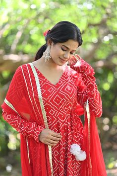 PRODUCT DESCRIPTION :-Time to Flaunt you 'Desi side' with this beautiful red Bhandej anarkali.Anarkali :- Reyon cottonPant :- CottonDupatta :- ChiffonColor:-Anarkali and dupatta - Red Pant - Off whiteCare Instructions :- Dry clean onlyModel Size :- Model is wearing XS sizeModel Height :- 5.6''DISCLAIMER :- Slight color variations may occur due to different screen resolution. Red Anarkali Set With Mirror Work Straight Kurta, Bollywood Red Anarkali Set With Dupatta, Red Anarkali Set With Mirror Work And Traditional Drape, Red Long Sleeve Anarkali Set With Cutdana, Red Anarkali Set With Mirror Work For Diwali, Red Salwar Kameez With Mirror Work, Red Anarkali Set For Navratri, Red Anarkali Salwar Kameez With Mirror Work, Red Anarkali Set With Straight Kurta