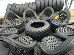 many tires are stacked on top of each other