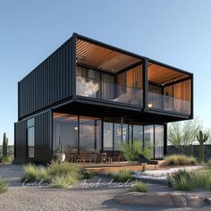 a house made out of shipping containers in the desert