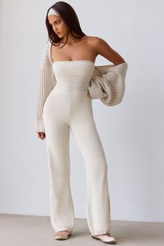 A sleek wardrobe essential that can be worn on its own or layered with separates from the collection for a coordinated look, this jumpsuit is spun from our premium chunky-knit stretch fabric. Breathable Outfits, Sleek Wardrobe, Knitted Jumpsuit, Bandeau Jumpsuit, Winter Jumpsuit, Black Backless Dress, Flare Jumpsuit, Knit Jumpsuit, Bandeaus