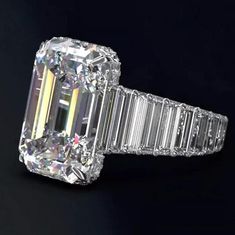 an emerald cut diamond ring with baguetts