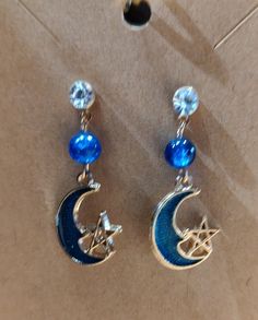 Blue Moon and Star with Blue Bead Post Earring Blue Star-shaped Bohemian Jewelry, Celestial Blue Beaded Jewelry, Blue Round Earrings With Moon Charm, Blue Moon-shaped Metal Jewelry, Blue Crescent Moon Charm Earrings, Blue Moon-shaped Earrings With Moon Charm, Blue Moon Shaped Earrings With Moon Charm, Blue Celestial Round Earrings, Blue Dangle Earrings With Moon Charm