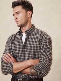 MADE WITH ORGANICALLY GROWN COTTON: Made with 100% organic cotton, so it's soft on you and the environment. UNTUCKED SLIM FIT: Designed with a shorter hemline to hit right at the hips. Button down collar. Long sleeves with adjustable double-button barrel cuffs and button vents. Button front closure. Chest pocket. Back yoke. Shirttail hem. Made exclusively for Banana Republic Factory. #817994 Timeless Patterns, Banana Republic Factory, Organic Cotton Fabric, Button Down Collar, The Environment, Chest Pocket, Cotton Shirt, Button Down Shirts, Banana Republic