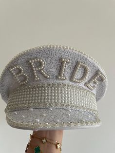 Make the bride feel incredible on her hen party with this stunning bridal hat! This embellished hat is a must-have for any bride to make her feel extra special - plus, it is the perfect instagrammable bridal hat! Style this glamorous bride hat with hen party decorations and accessories from our Hen Weekend collection, perfect for those brides who want a trip away! Each pack contains 1 x Bride to Be hat measuring 28cm (H) x 28cm (W) White Cap Mini Hat For Weddings, Embellished Party Cap, Lace Table Runner Wedding, Glitter Hat, Hen Party Decorations, Dope Jewelry Accessories, Hen Weekend, Bling Jeans, Bride Hat