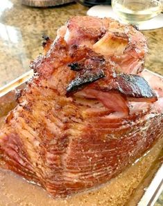 a large piece of meat sitting on top of a counter