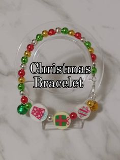 Bracelets- Christmas Design  6mm beads: Red, Silver, Gold & Green, Gingle Bell Materials: 6mm Hard Beads                   Round Bead                   Silver finished clousure                    Metal Gingle beads Red Beaded Bracelets For Christmas Gifts, Multicolor Christmas Gift Bracelets, Christmas Gift Beaded Bracelets With Round Beads, Multicolor Round Beads Christmas Bracelets, Multicolor Round Beads Bracelets For Christmas, Christmas Holiday Bracelets With Round Beads, Festive Christmas Bracelets With Round Beads, Holiday Gift Bracelets With Round Beads, Christmas Festive Round Beads Bracelets