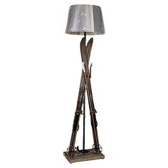 a lamp that has skis and poles on it