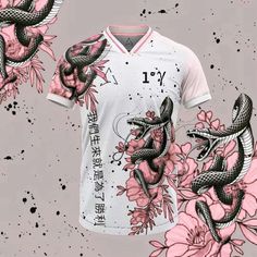 a t - shirt with an image of two snakes on it and pink flowers in the background