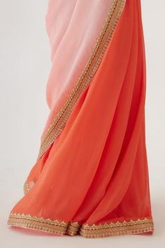 Shop for Nikasha Peach Viscose Georgette And Pure Raw Silk Ombre Saree With Blouse for Women Online at Aza Fashions Pink Georgette Pre-draped Saree With Embroidered Border, Reception Saree With Embroidered Border In Pink, Pink Pre-draped Saree With Embroidered Border For Diwali, Semi-stitched Orange Saree With Mirror Work, Pink Georgette Blouse Piece With Embroidered Border, Elegant Pink Pre-draped Saree With Embroidered Border, Traditional Orange Saree With Mirror Work, Pink Pre-draped Saree With Embroidered Border In Georgette, Orange Mirror Work Dupatta For Reception