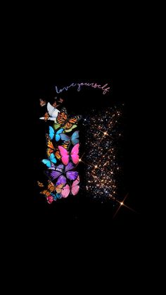 the back side of a cell phone with butterflies on it, and an image of city lights in the background