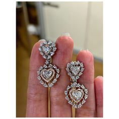 A beautiful 3.6 carat Heart Shape Diamond dangle earrings, G.H color SI quality, with around 1.5 carat pear and round shape diamonds surrounding it. All set in solid 18K White Gold. Diamond Dangle Earrings, Heart Shaped Diamond, G H, Heart Shape, Jewelry Earrings Dangle, Heart Shapes, Pear, Dangle Earrings, Jewelry Earrings