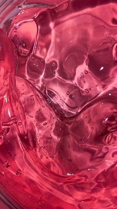 the inside of a glass container filled with water and liquid, as seen from above